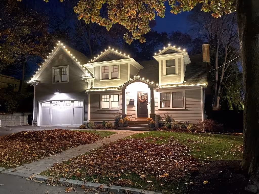 Newton MA home with professional Christmas lights installation and holiday decorations Newton MA home with professional Christmas lights installation and holiday decorations