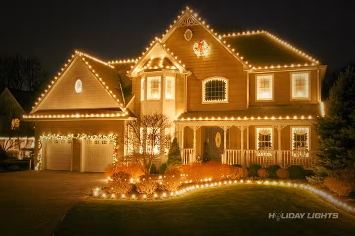 Residential holiday lights installation in Maine